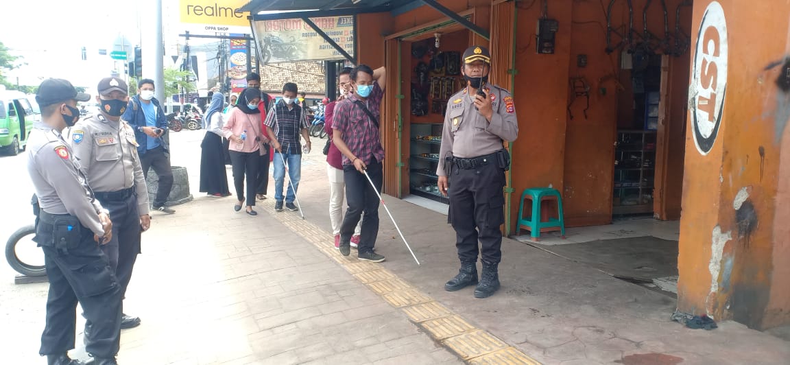 Jalan Santai Disabiltas Ditengah Pandemi Covid-19, Polisi Laksanakan Pengawalan